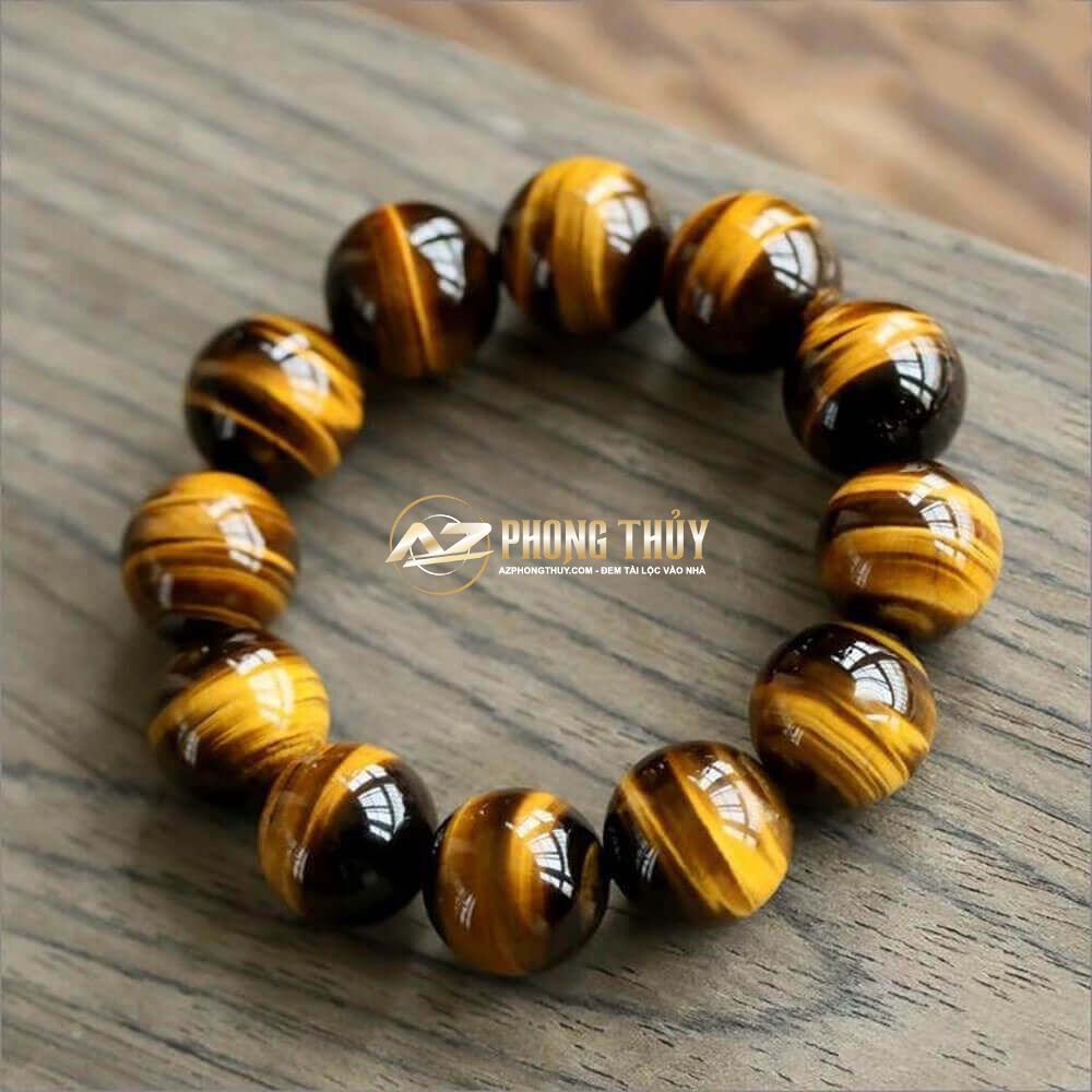 Vòng tay mắt hổ vàng nâu tương hợp với nam mệnh Thổ